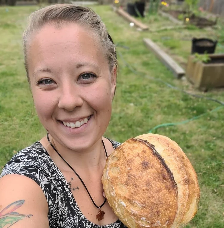 Shae holding bread